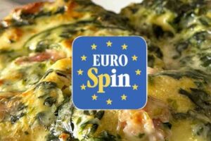 dettaglio d un piatto di lasagne e il logo eurospin