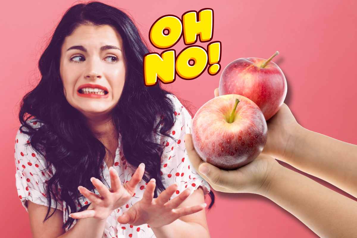 donna spaventata, grafica oh no, mani con mele